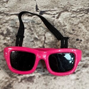 1980s Pink Plastic Sunglasses with Black Strap Brooch
